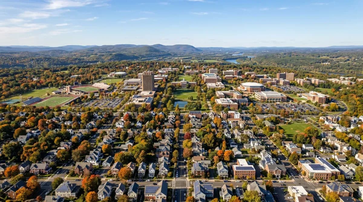 Aerial view of Amherst Massachusetts with solar panels on residential rooftops