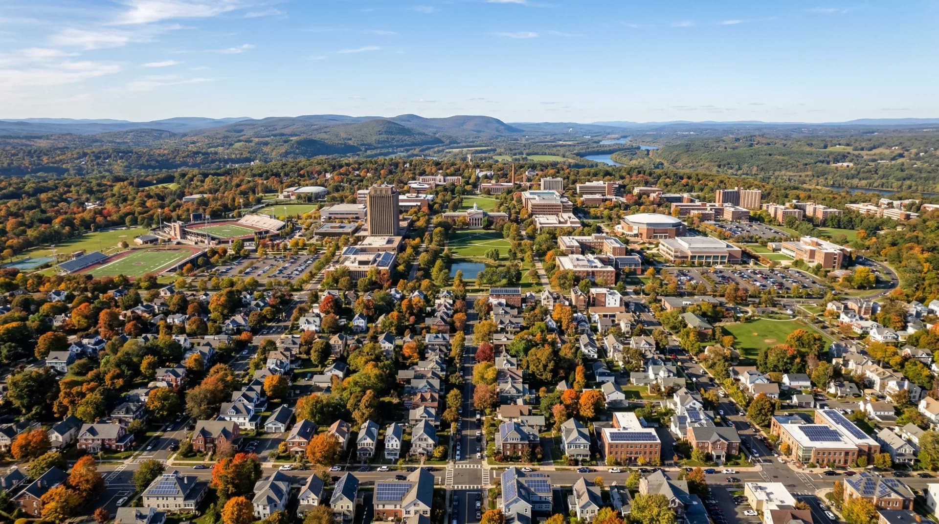 Aerial view of Amherst Massachusetts with solar panels on residential rooftops