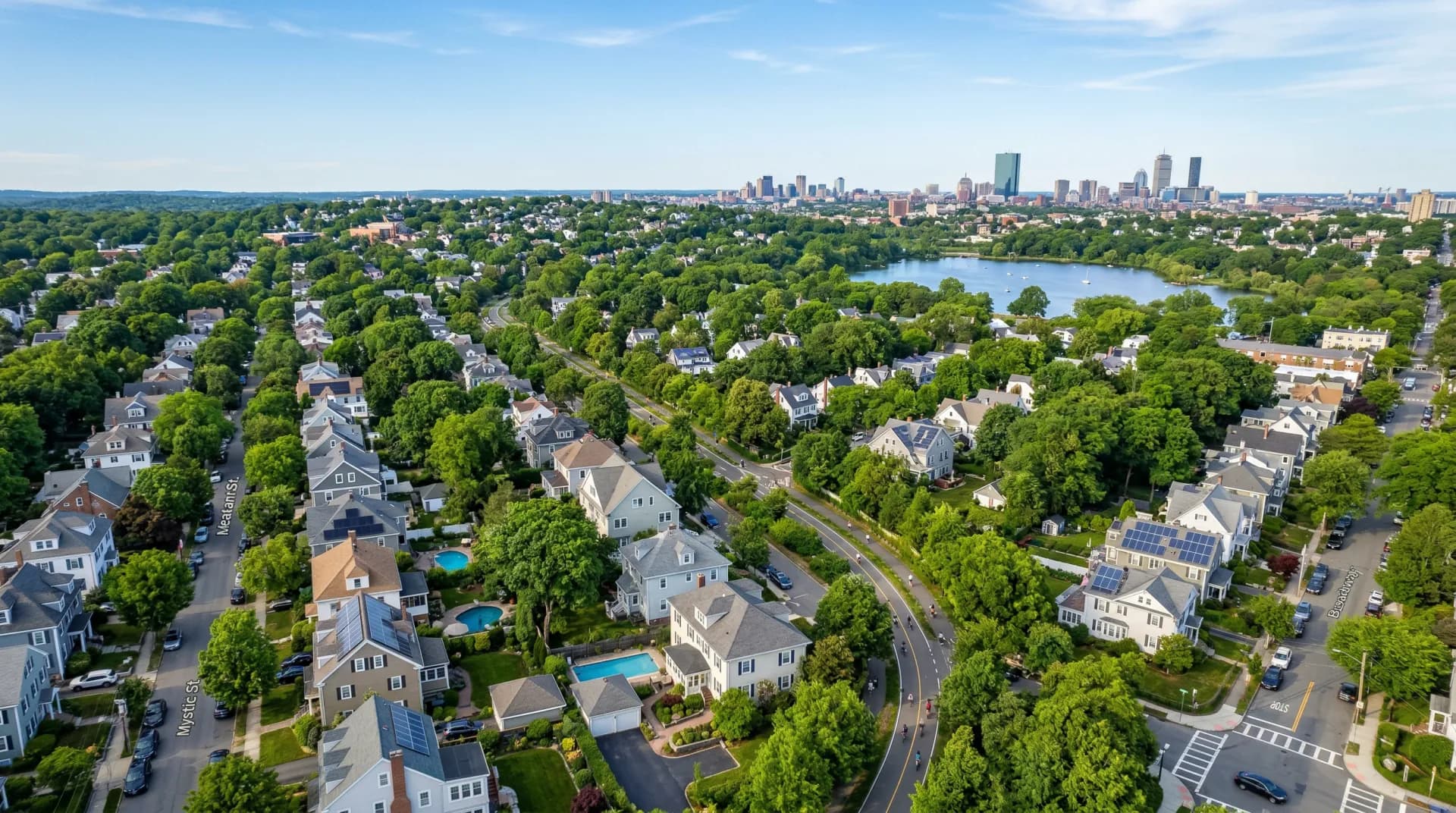 Aerial view of Arlington Massachusetts with solar panels on residential rooftops