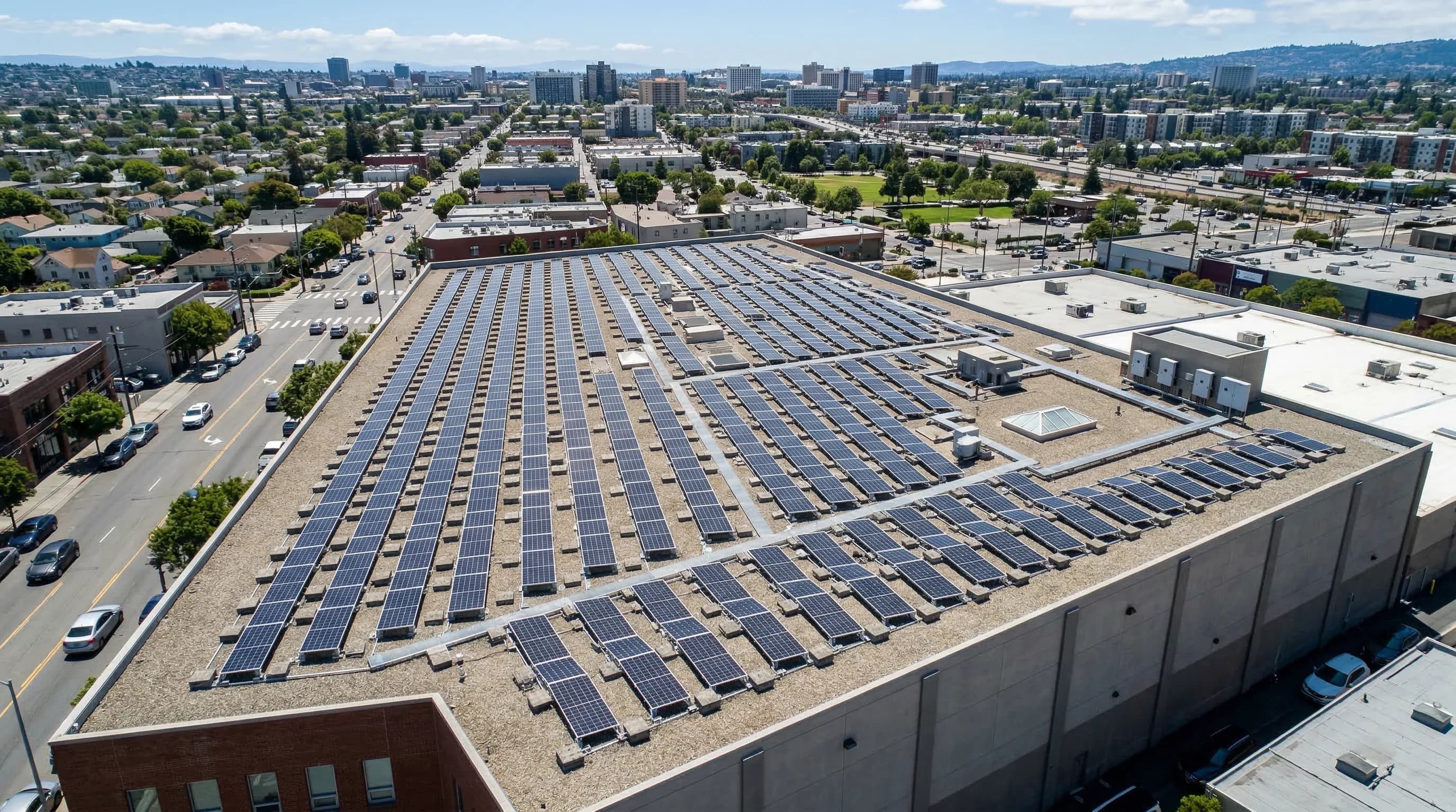 Solar panels installed on a flat roof with ballasted racking system at optimal tilt angle