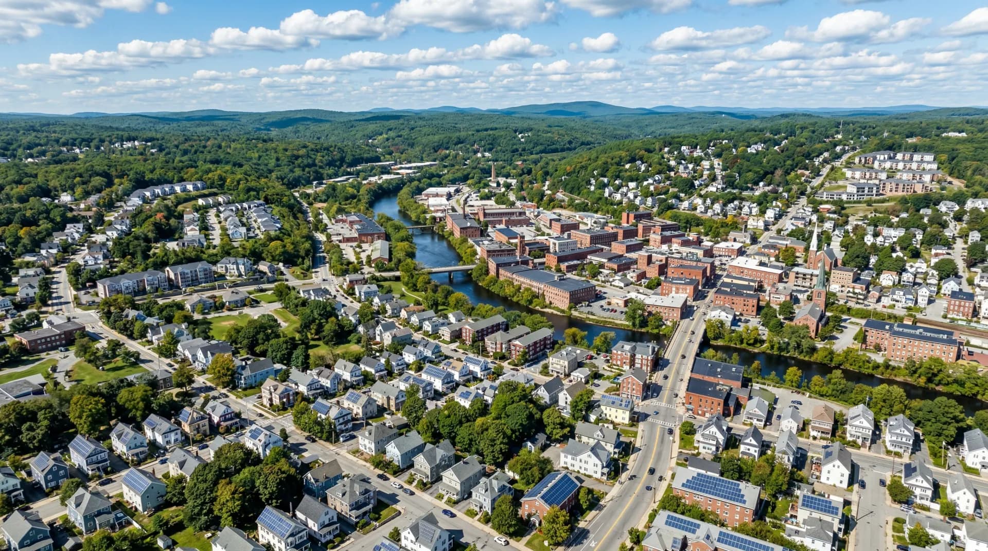 Aerial view of Fitchburg Massachusetts with solar panels on residential rooftops