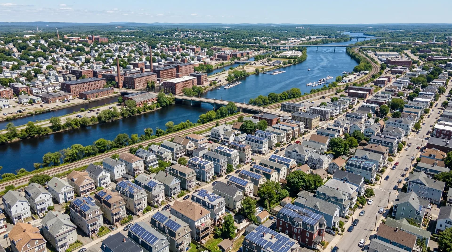 Aerial view of Lawrence Massachusetts with solar panels on residential rooftops
