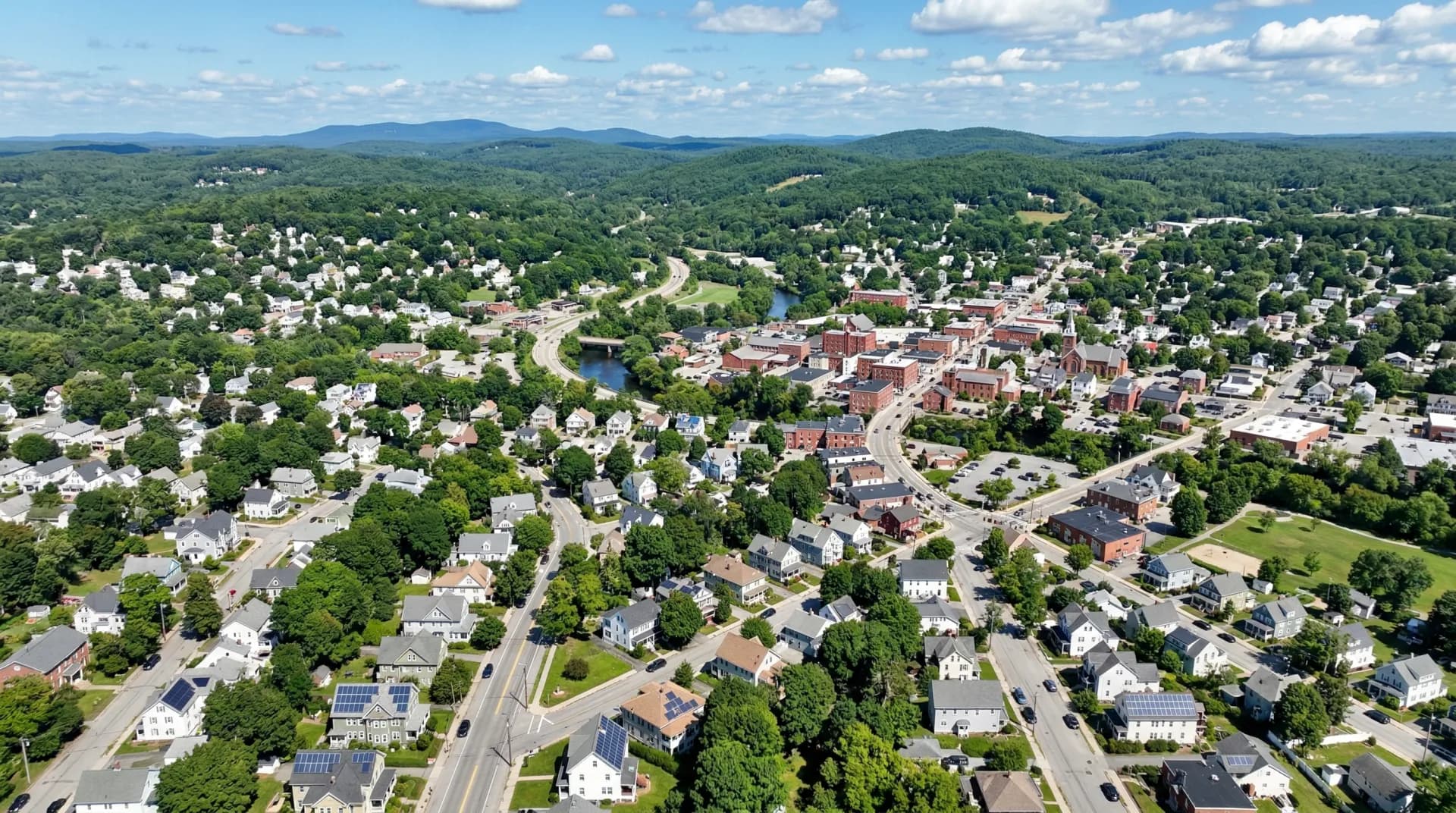 Aerial view of Leominster Massachusetts with solar panels on residential rooftops