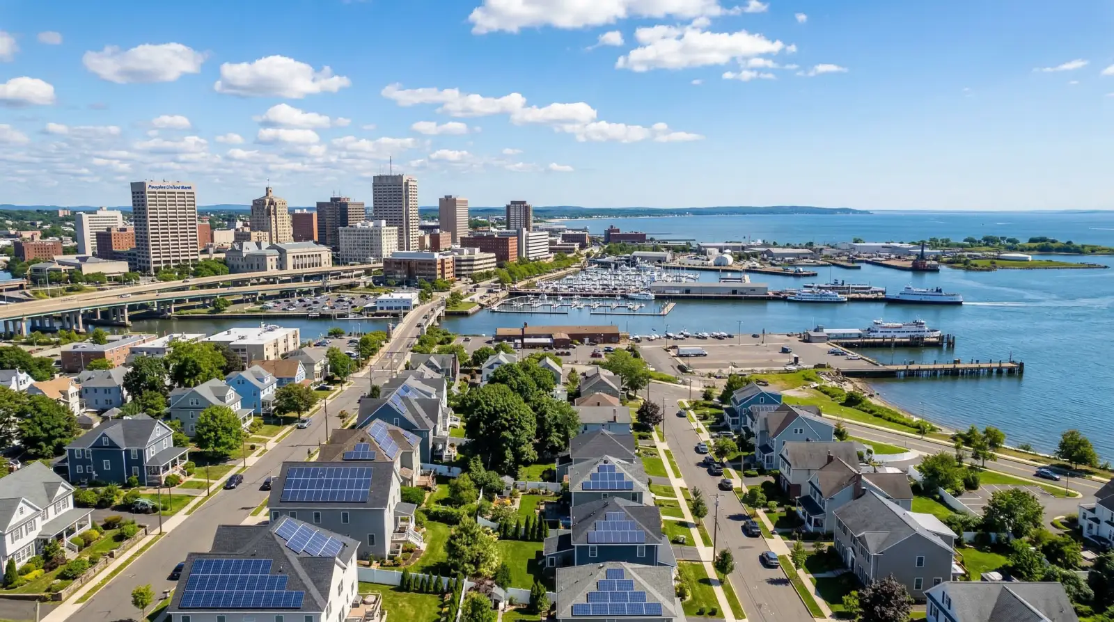 Bridgeport CT waterfront skyline with residential solar panel installations