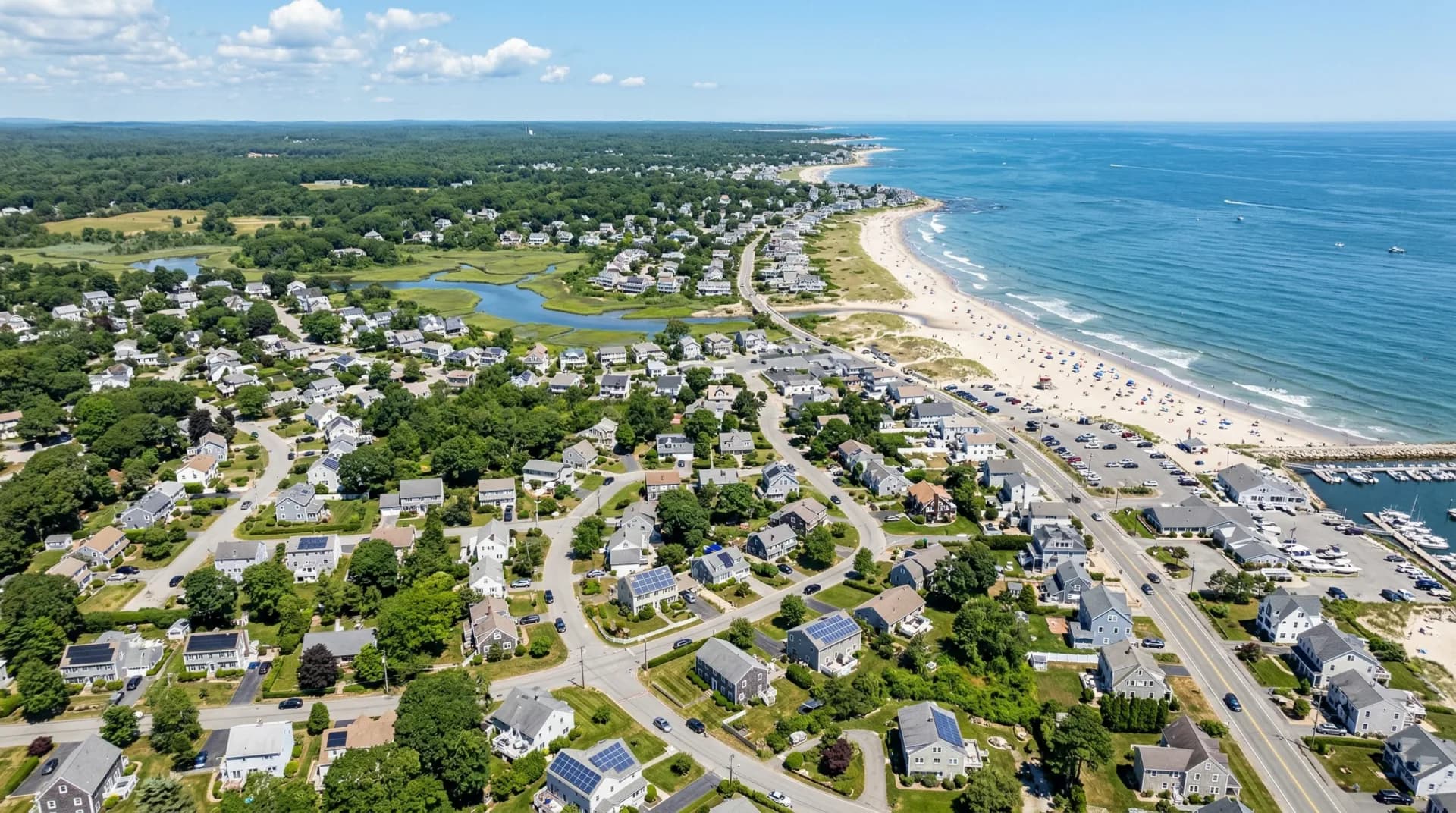 Aerial view of Marshfield Massachusetts with solar panels on residential rooftops