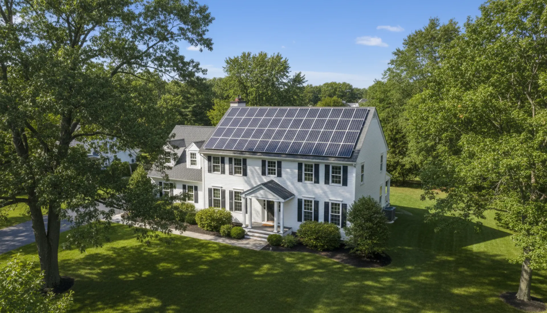 Residential solar panel installation in New England showing perfectly aligned panel rows