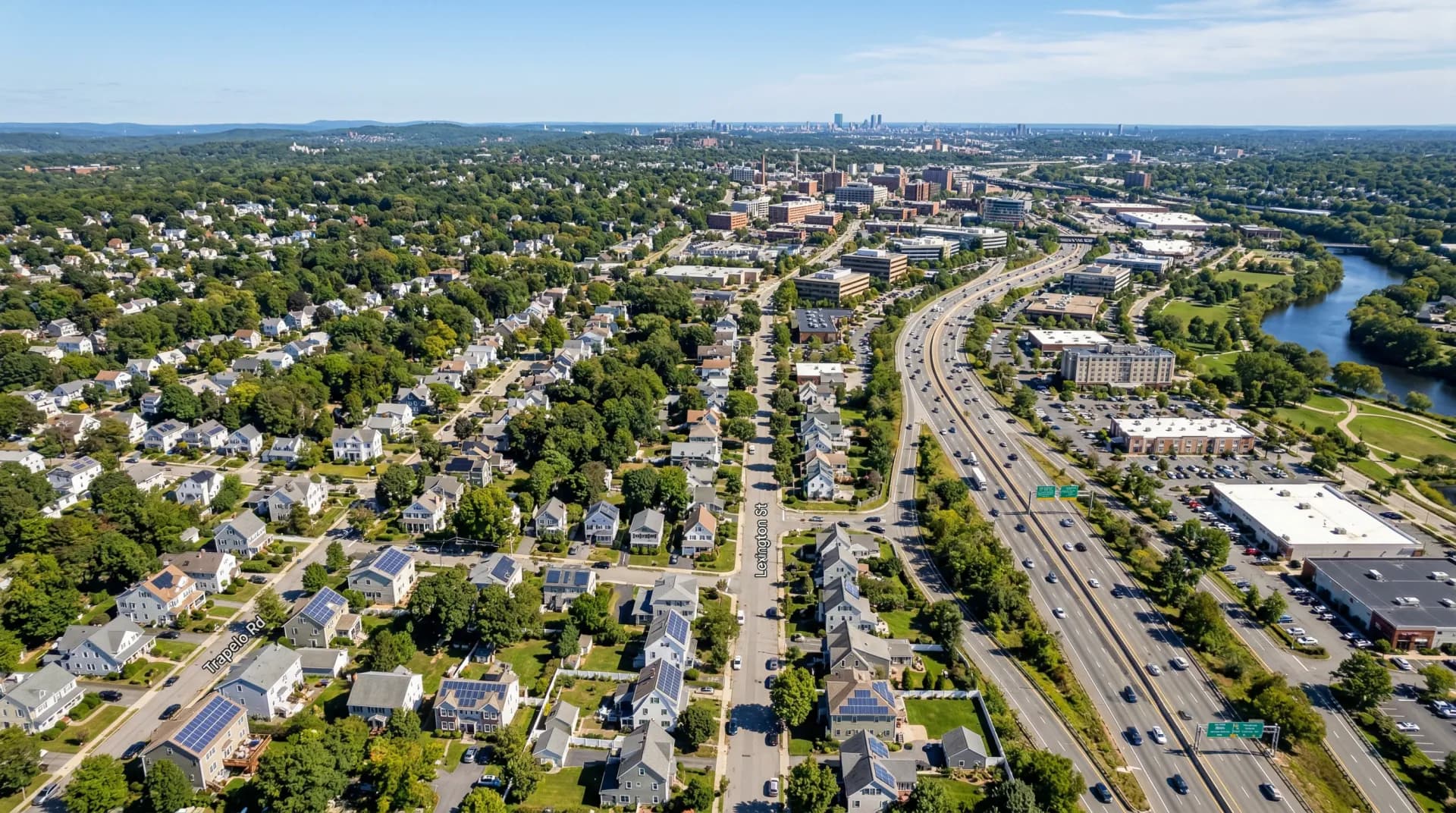 Aerial view of Waltham Massachusetts with solar panels on residential rooftops