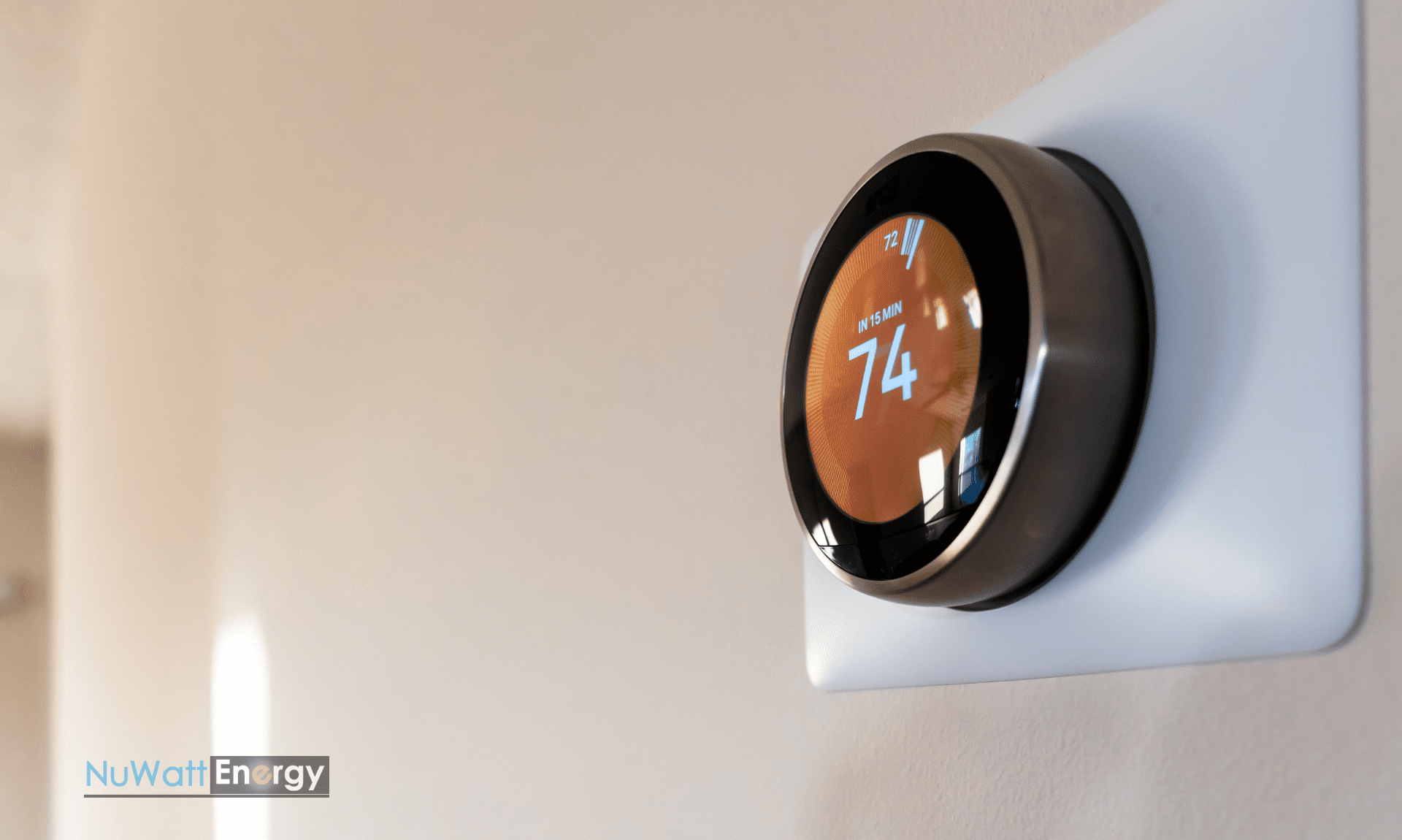 Smart thermostat in new home. / via Getty Images